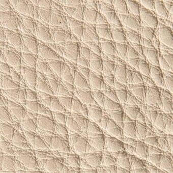 Cream crocodile-effect leather texture, “pelleextra 321” by Verzelloni, displays raised linear ridges and rounded nodes in a warm beige tone.